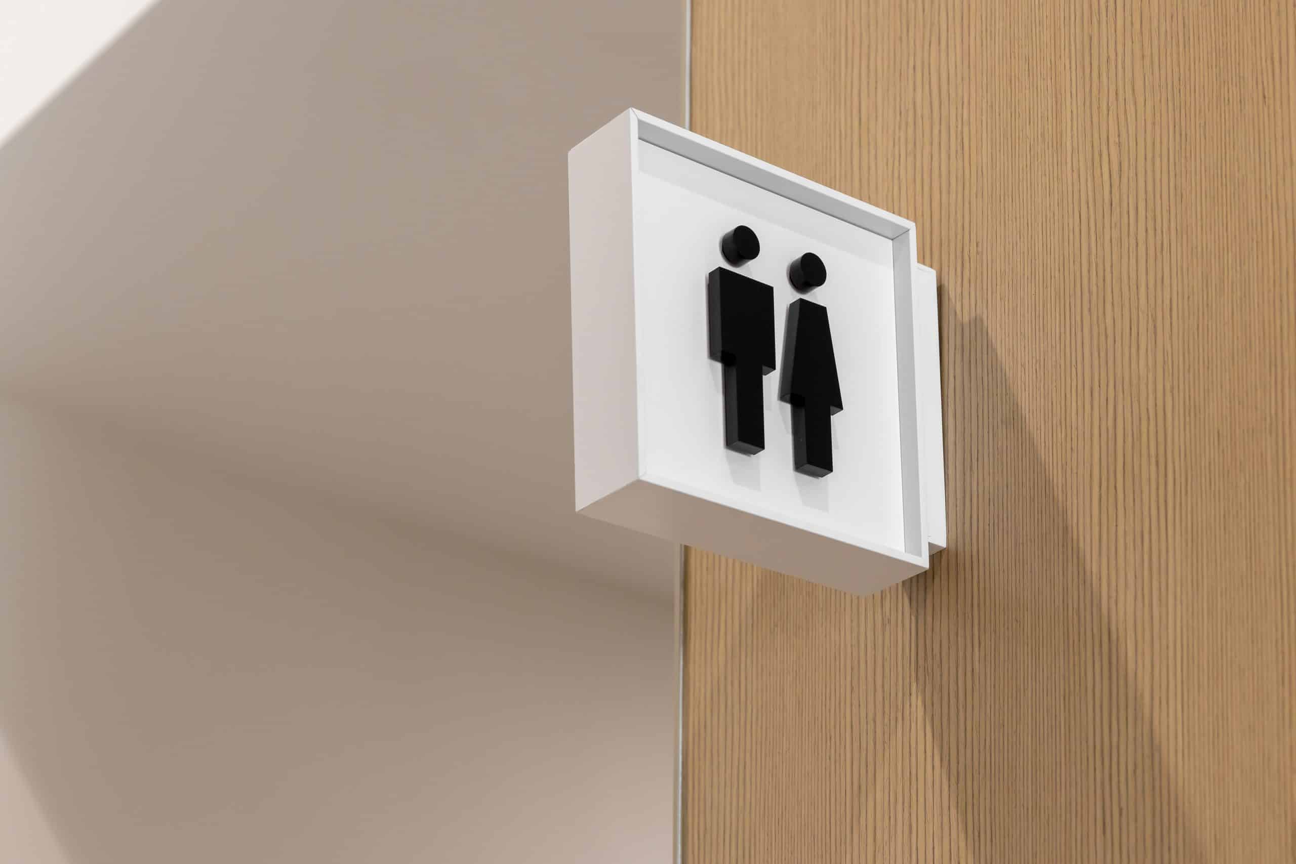 Unisex restroom sign, t-mount wayfinding.